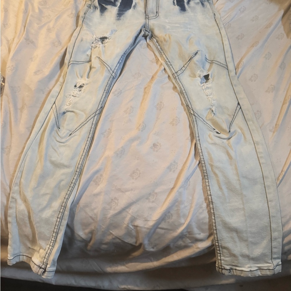 Distressed Light Wash Skinny Jeans